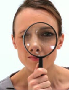 Lady with magnifying glass