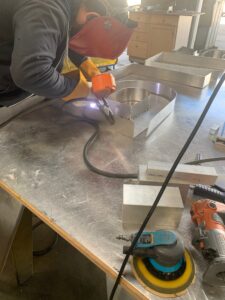 Welding a reverse channel letter