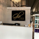 Lobby Sign Glo Salon Interior